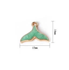 Detail view of a 14x17mm green enamel fishtail pendant with golden metal frame