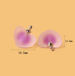 Detailed view of frosted acrylic heart charm with 18.5x13.5mm size dimensions for DIY