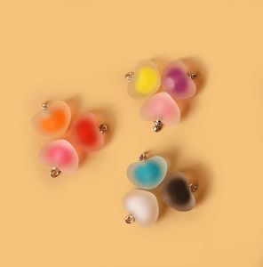 Frosted acrylic heart pendants in vibrant colors with silver rings for DIY jewelry