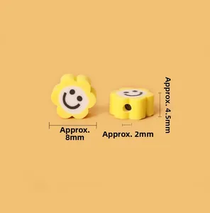 Vue macro de perles fleurs jaunes avec smiley et mesures de 8mm pour bijoux artisanaux