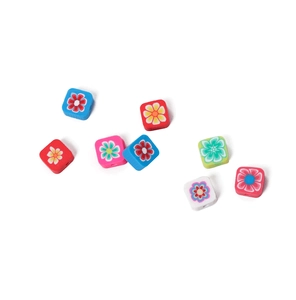 Close-up of colorful square polymer clay flower beads with holes for DIY jewelry making