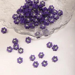 Purple flower-shaped polymer clay beads with yin yang centers for DIY jewelry making