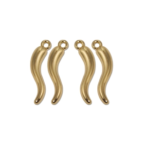 Detail of four golden Cornicello charms with polished mirror finish for DIY jewelry