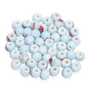 Detailed view of light blue 10mm ceramic beads with red-brown floral ink patterns