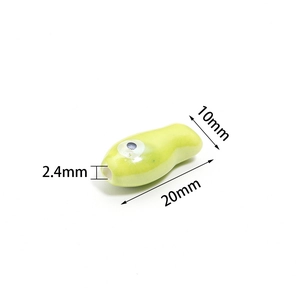 Light green fish-shaped ceramic bead for DIY jewelry with 20mm length and 2.4mm hole size