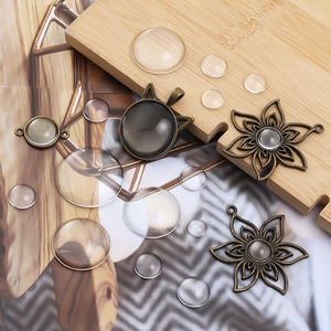 Clear glass cabochons and vintage bronze pendant trays for DIY jewelry making accessories