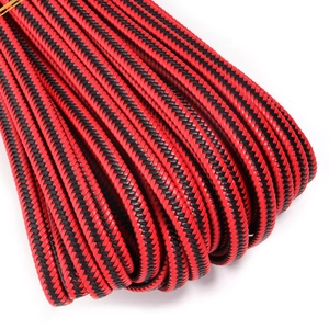 Detail view of red and black braided 10-strand PU leather cord for DIY jewelry