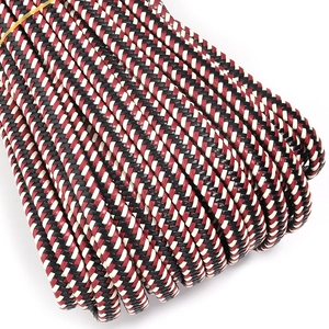 Close-up of red, black, and white braided 10-strand PU cord with herringbone pattern