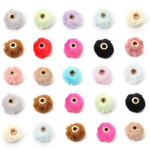 Macro shot of 25 colorful faux fur pompom beads with large metal holes for DIY jewelry