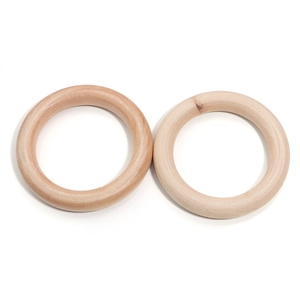 Natural round wood rings set for DIY crafts with smooth surface and visible wood grain