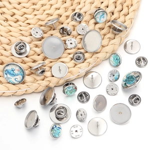 Detailed view of DIY stainless steel brooch base and nautical glass cabochons