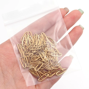 Gold plated stainless steel paperclip chain links for DIY jewelry making in a bulk bag