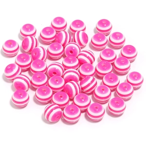 Close-up of 20mm pink and white striped resin barrel beads for DIY jewelry making