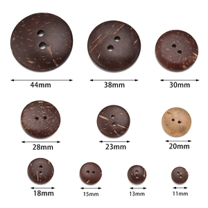 Various sizes of natural round coconut shell buttons ranging from 11mm up to 44mm