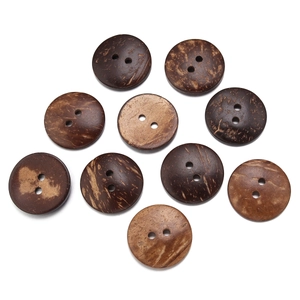 Detailed view of natural coconut shell buttons with rustic textures for DIY sewing