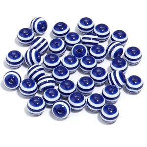 Detail view of 20mm blue and white striped resin beads for DIY jewelry making