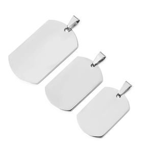 Detailed view of three polished stainless steel blank military tags in various sizes
