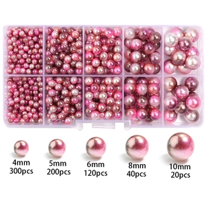 Dettaglio del set di perle rosa sfumate con 10 scomparti e dimensioni da 4mm a 10mm