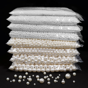 Detailed set of multi-size round white and cream ABS pearls for DIY jewelry making