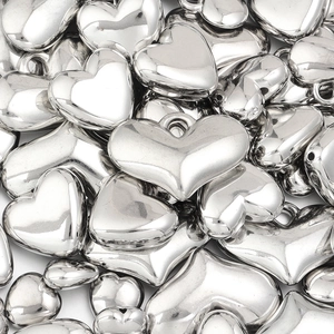 Close-up of polished silver heart-shaped CCB beads for DIY jewelry making accessories