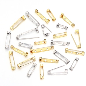 Detail of DIY stainless steel safety pin backings in gold and silver plating