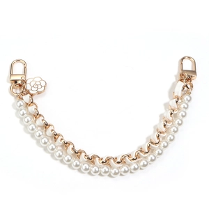 Dual-layer pearl and gold braided chain strap with white camellia flower pendant detail