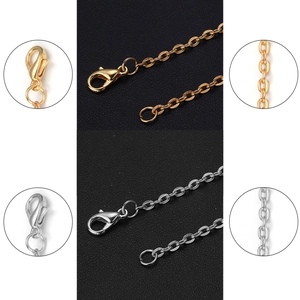 Macro detail of gold and silver lobster clasps on high-quality DIY metal chain extenders