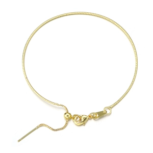 Detail of adjustable gold snake chain with lobster clasp and slider bead for DIY jewelry