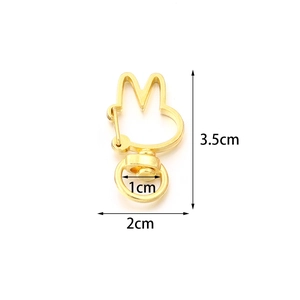 Detailed size view of rabbit shaped golden metal lobster clasp for jewelry making
