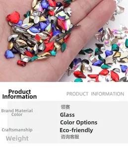 Detailed view of colorful glass nail rhinestones in heart, star and rectangular shapes