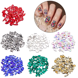 Flatback glass rhinestones for nail art in various geometric shapes and vibrant colors