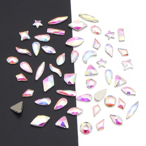 Macro detail of AB iridescent mixed shape flatback crystals for DIY nail art and jewelry
