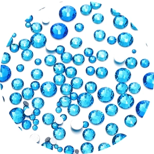 Macro shot of faceted sapphire blue flatback rhinestones for nail art and DIY jewelry