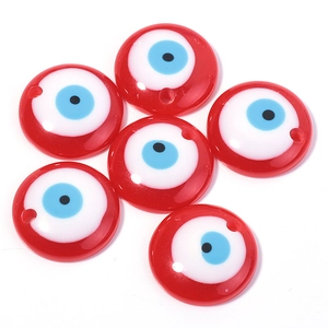 Close-up of 6 red Evil Eye resin beads with precision holes for DIY jewelry crafting