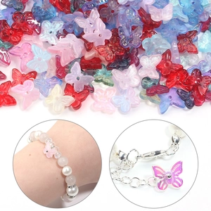 Macro detail of gradient butterfly beads and their application on a beaded bracelet