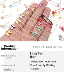 Close-up of colorful pear-shaped safety pins in various metallic and painted finishes