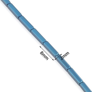 Close-up of 8x2mm blue hematite column beads showing metallic texture for DIY jewelry