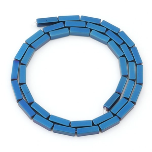 Macro shot of metallic blue rectangular hematite beads for DIY jewelry making