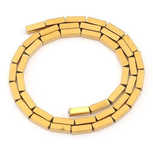 Close-up of gold-plated hematite square column beads for DIY jewelry making