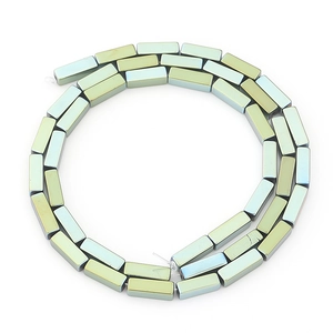 Macro shot of iridescent rectangular hematite spacer beads for DIY jewelry making