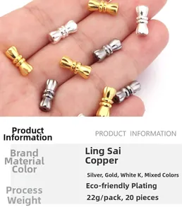 Detailed view of 11mm copper bow-shaped connectors for DIY jewelry making
