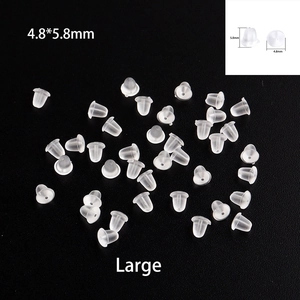 Macro detail of 4.8x5.8mm large silicone earring backs with transparent bullet shape
