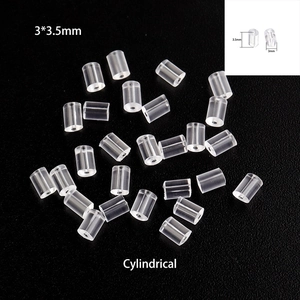 Macro shot of 3x3.5mm clear cylindrical silicone earring backs for DIY jewelry parts