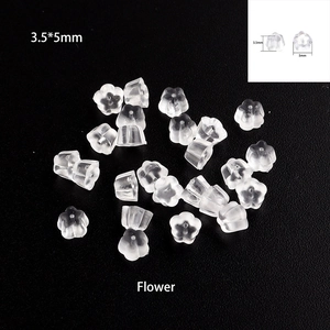 Macro detail of 3.5x5mm flower shaped silicone earring backings with dimensions