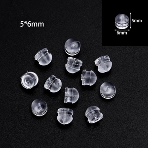 Detailed macro view of 5x6mm clear silicone plum blossom earring backs with dimensions