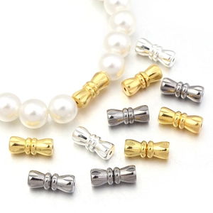 Bowtie shaped 11mm brass connector beads for jewelry making in gold silver and grey