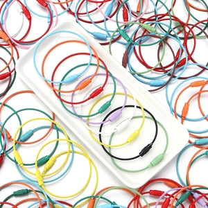 Detail of colorful plastic coated stainless steel wire keychains with knurled screw connectors