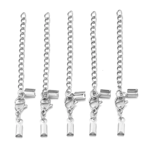 Detailed view of silver stainless steel lobster clasps with extension chains for DIY jewelry