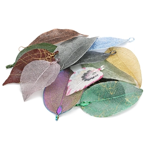 Macro detail of multi-colored leaf vein pendants with metal loops for DIY jewelry making
