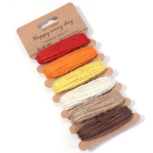Detail view of 2mm braided jute twine set in six colors on vintage kraft cards